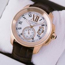 Calibre de Cartier pink gold mens watch W7100009 silver dial brown leather strap
